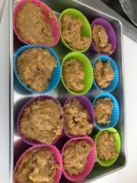 muffin batter in baking cups