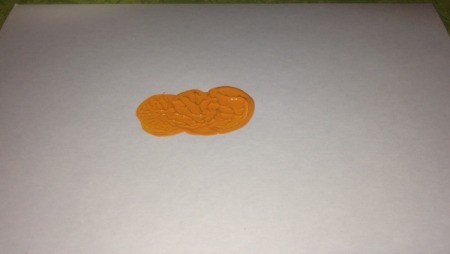 Bottle Cap Pumpkin Stamping - stamp two more times