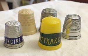 Value of an Antique and a Vintage Thimble - four thimbles
