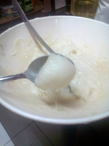 spooning steamed batter