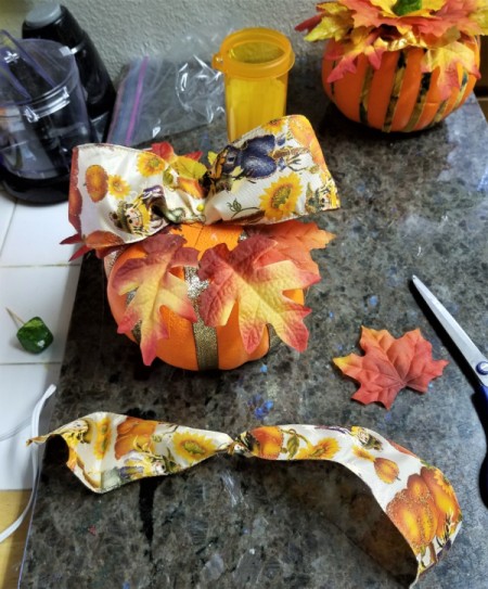 Embellish a Dollar Tree Pumpkin - make a bow with the wire edged ribbon