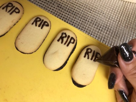 writing RIP on small cookies