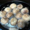 Golden Sesame Balls turned in pan