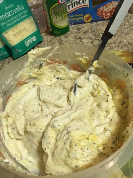 mixing ricotta and herbs