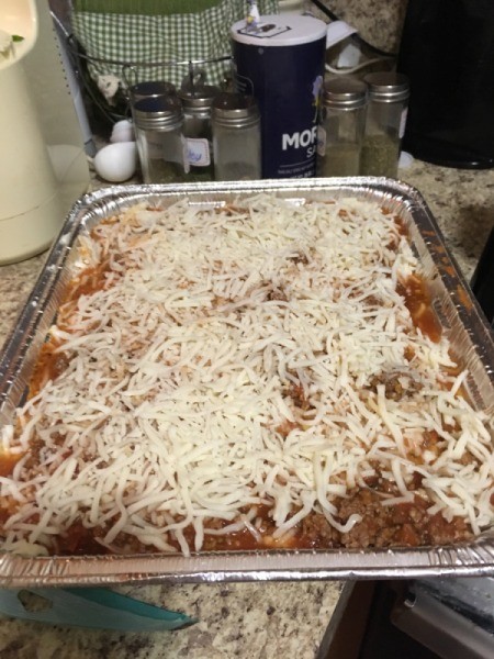 sauce and grated cheese layer on lasagna