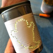 Tin Can Lanterns - check hole size by putting a light inside - increase  a hole size as needed
