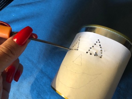 Tin Can Lanterns - use smaller holes on smaller cans or on more intricate designs