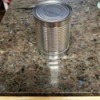 Cans Can Do So Many Things - larger can inverted over the smaller one