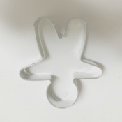 A snowman cookie cutter turned sideways to resemble a reindeer.