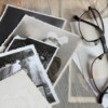 Pile of black and white photos.
