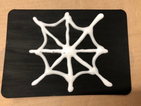 Salt Spider Web Painting - draw glue lines connecting the spokes, with drooping U shapes