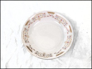 Value of 16 Serving China - dinner plate with a floral pattern around the edge