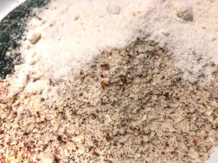 mixing crushed almonds and flour
