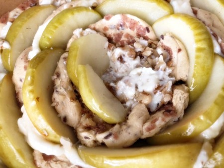 added apple slices, dough and icing