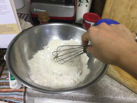 whisking flour