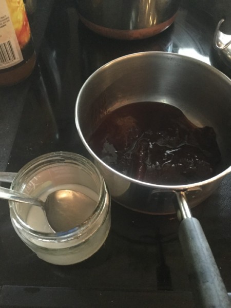 mixing corn starch and jam in pan