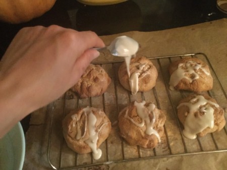 spooning icing on Lemon Spelt Scones