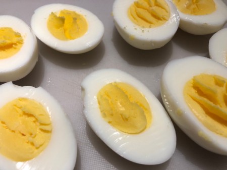 halved hard boiled eggs