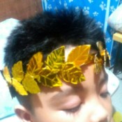 Laurel Leaf Headdress - child wearing the laurel leaf headdress