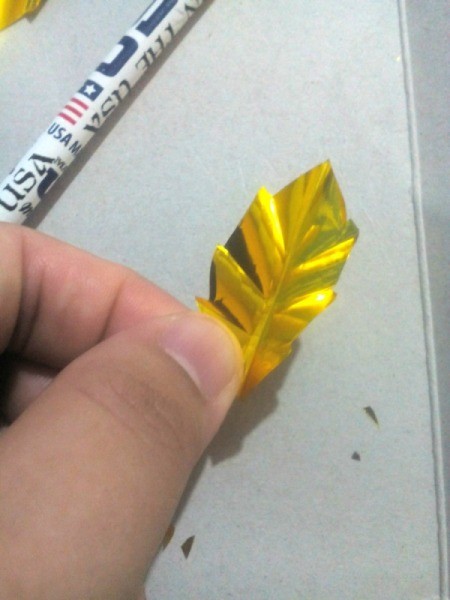 Laurel Leaf Headdress - pinch the leaves diagonally upwards and crease