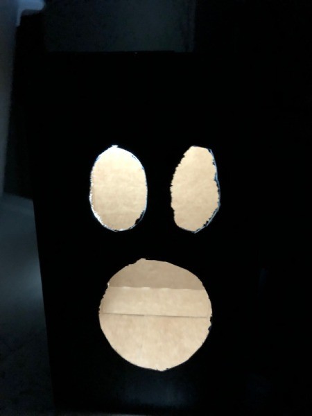 Cardboard Halloween Pumpkin and Ghost - closeup of ghost box lit from inside