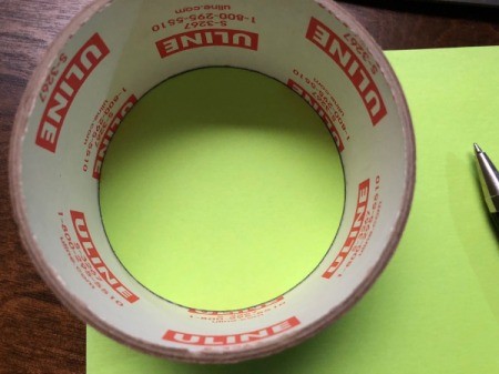 Birthday Cake Gift Box - trace a circle using the inside of the roll, cut out and then make another circle using the outside of the roll as the template