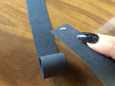 Squawking Crow Paper Craft - add glue to the end of another strip