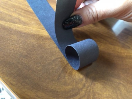 Squawking Crow Paper Craft - tuck it under the first curl glue side down