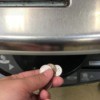 Using coins at the self check out line at the grocery store.
