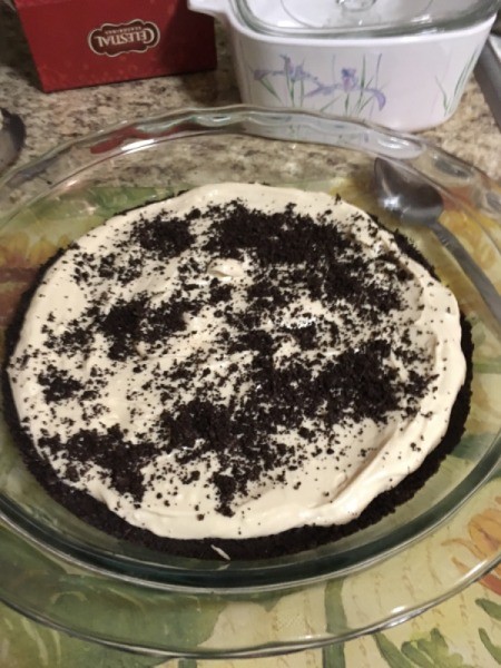 Oreo crumbs on cream cheese mixture