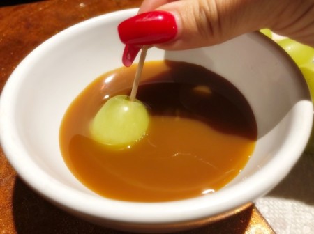 dipping grape in Caramel