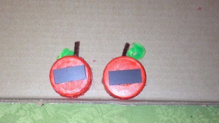 Milk Lid Pumpkin Magnets - hot glue a magnet to the back of each pumpkin