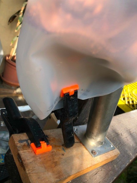 Milk Jug Skulls - with gloves on begin pulling the jug down on the skull, clip together under the jaw