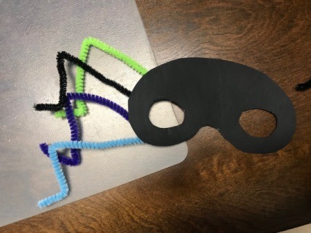 Last Minute Spider Face Mask - hot glue the legs to the dry mask