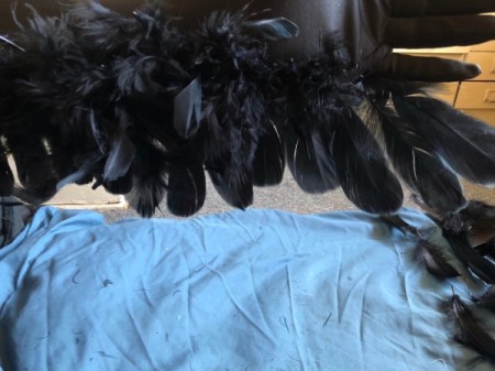 Raven Masquerade Costume - continue glueing feathers the length of the boa