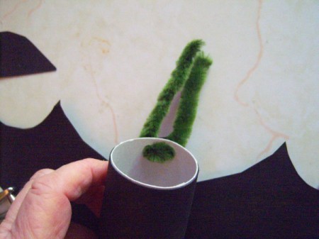 Hanging Bats - slide the pipe cleaner through the two holes from the inside