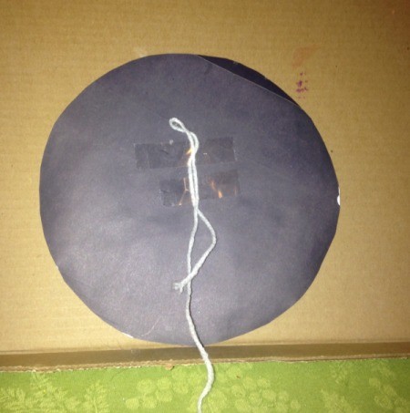 Marble Painted Paper Spider Web - tape folded yarn to back of circle