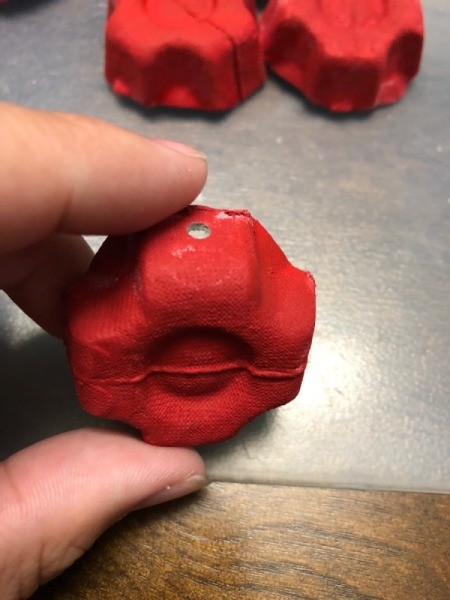 Christmas Egg Carton Wreath - punch a second one across from the first