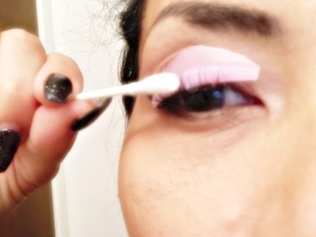 DIY Long-Lasting Eyelash Lift - remove plastic wrap and wipe off setting lotion with a Q-tip