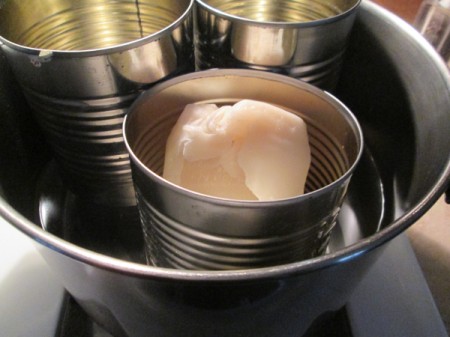 Using Leftover Candle Wax For Gifts  - leftover wax in tin can inside pot