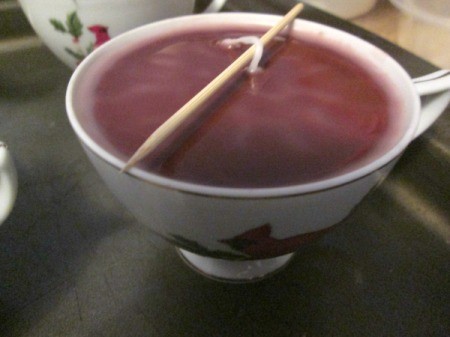 Using Leftover Candle Wax For Gifts  - cooling wax in cup