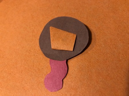 Pinecone Turkey -  use regular glue to attach a piece of folded paper to the back of the head