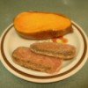 Fried Spam on plate with bread