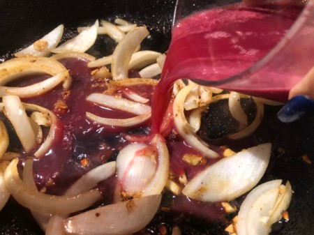adding Pomegranate juice to pan