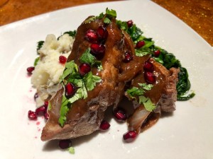 Glazed Pomegranate Pork Ribs on plate