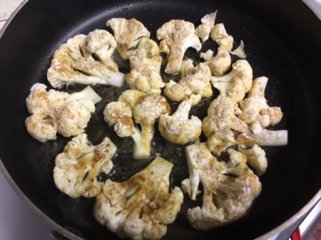 browning Spicy Cauliflower in pan
