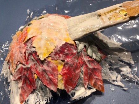 Autumn Leaves Centerpiece - continue adding more leaves to top and sides  - when done cover with one more layer of Mod Podge