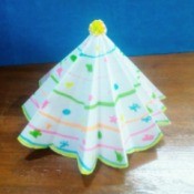 Paper Christmas Tree - paper tree on a wooden surface