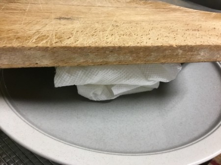 weigh tofu pieces in paper towels