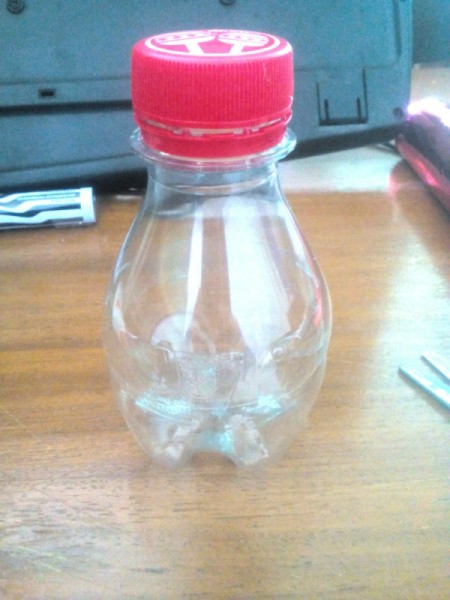 Apple-Bottle Christmas Gift Container - base and top put back together to form an apple shape